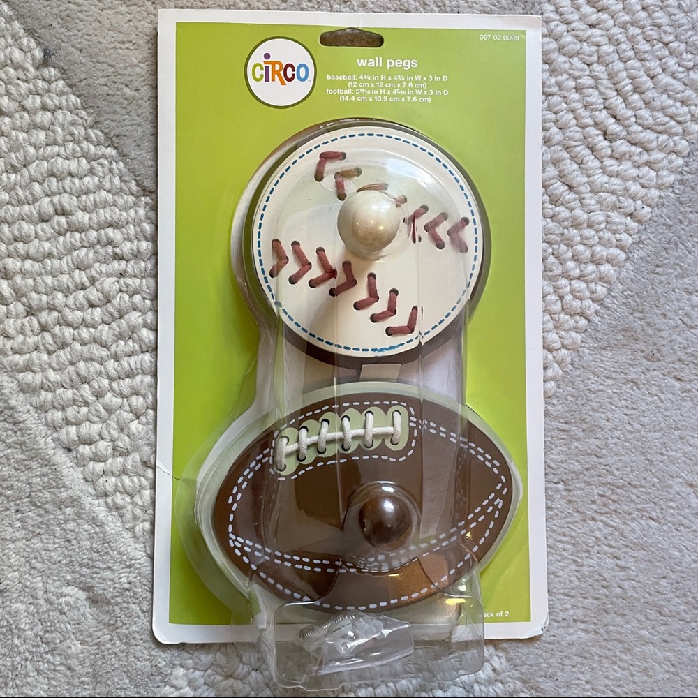 Baseball and football hanging pegs